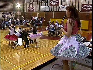 Competition Underway at Teen Festival - Caller at the microphone